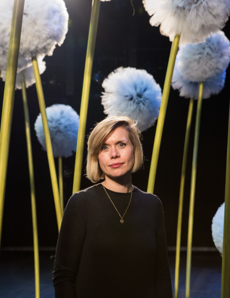 A head- and torso-shot of Jenny Mollica